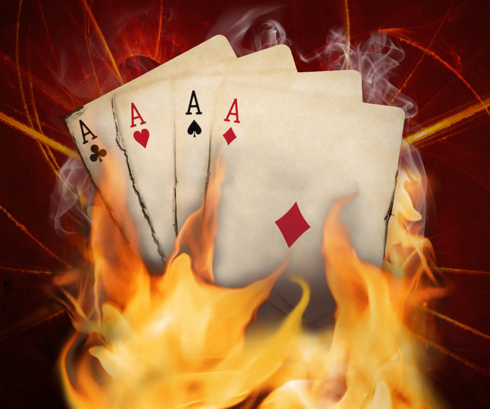 playing cards with cgi flames. Newcomer WSOP MI Heats Up MI Online Poker Scene